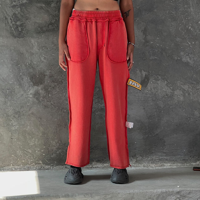 INVERTED TRACKPANTS IN RED UNISEX]